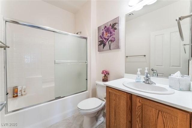 2413 Mourning Warbler Ave, North Las Vegas, NV 89084 - full bath with toilet, vanity, combined bath / shower with glass door, and tile patterned flooring