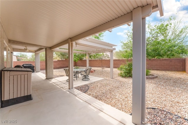 2413 Mourning Warbler Ave, North Las Vegas, NV 89084 - fenced backyard featuring outdoor dining space and a patio