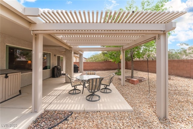 2413 Mourning Warbler Ave, North Las Vegas, NV 89084 - fenced backyard featuring a pergola, outdoor dining area, and a patio area