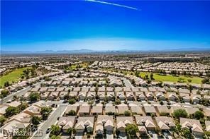 2413 Mourning Warbler Ave, North Las Vegas, NV 89084 - aerial perspective of suburban area with a mountain backdrop