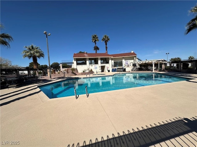 5720 Goldmount Ave, Las Vegas, NV 89107 - community pool featuring a patio