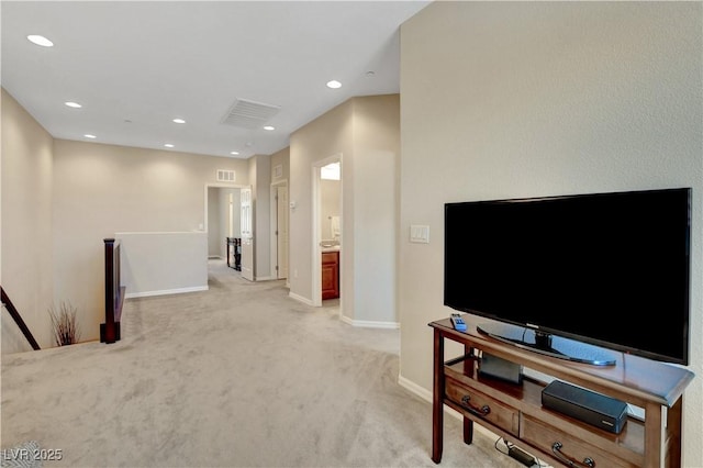 1560 Plaza Centre Dr Unit 103, Las Vegas, NV 89135 - living room with light colored carpet, baseboards, and recessed lighting