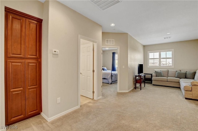 1560 Plaza Centre Dr Unit 103, Las Vegas, NV 89135 - living room with light carpet, baseboards, and recessed lighting