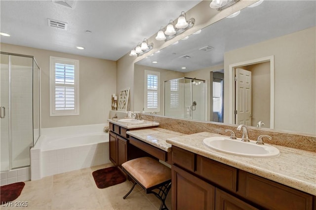 1560 Plaza Centre Dr Unit 103, Las Vegas, NV 89135 - bathroom with double vanity, a stall shower, a bath, and tile patterned flooring