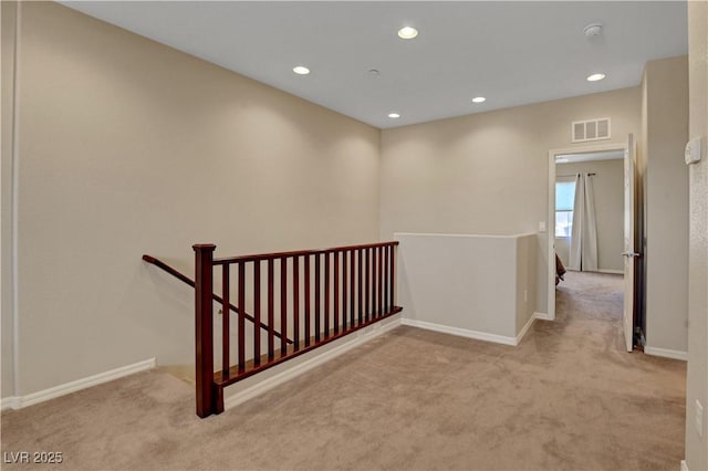 1560 Plaza Centre Dr Unit 103, Las Vegas, NV 89135 - hall with an upstairs landing, carpet floors, recessed lighting, and baseboards