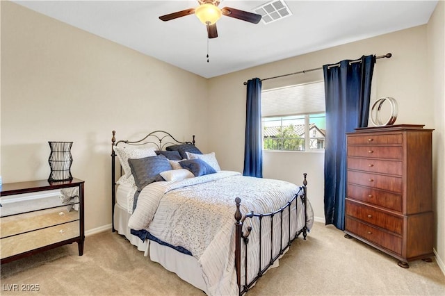 1560 Plaza Centre Dr Unit 103, Las Vegas, NV 89135 - bedroom with light carpet, baseboards, and a ceiling fan