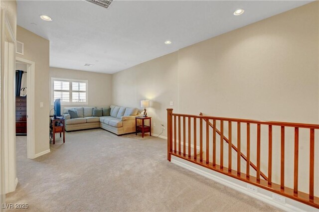 1560 Plaza Centre Dr Unit 103, Las Vegas, NV 89135 - living area featuring carpet flooring, baseboards, and recessed lighting