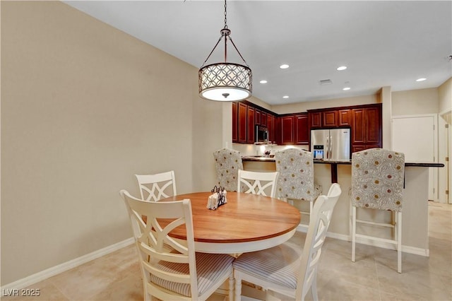 1560 Plaza Centre Dr Unit 103, Las Vegas, NV 89135 - dining space featuring baseboards, recessed lighting, and light tile patterned floors