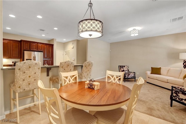 1560 Plaza Centre Dr Unit 103, Las Vegas, NV 89135 - dining room with recessed lighting, light tile patterned floors, and baseboards