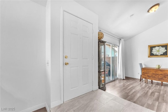 110 Huckleberry Ln, Henderson, NV 89074 - foyer with lofted ceiling, baseboards, and wood finished floors