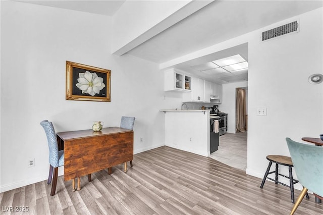 110 Huckleberry Ln, Henderson, NV 89074 - dining room with light wood finished floors and baseboards