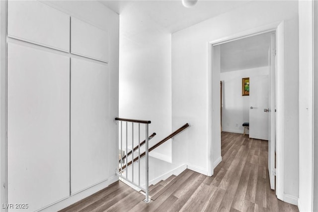 110 Huckleberry Ln, Henderson, NV 89074 - hall featuring an upstairs landing, light wood finished floors, and baseboards