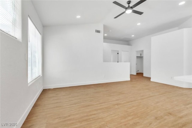 831 Purple Sage Ter, Henderson, NV 89015 - unfurnished living room with a ceiling fan, recessed lighting, baseboards, and light wood-style floors