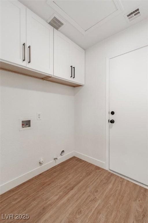 831 Purple Sage Ter, Henderson, NV 89015 - washroom featuring cabinet space, light wood-style flooring, washer hookup, and baseboards