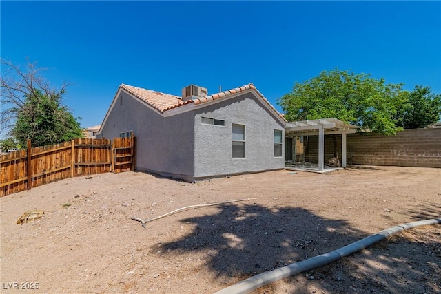 831 Purple Sage Ter, Henderson, NV 89015 - back of house with a tiled roof, stucco siding, a pergola, and cooling unit