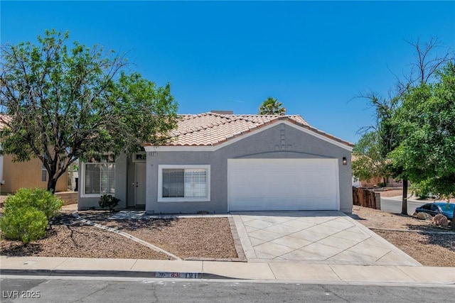 831 Purple Sage Ter, Henderson, NV 89015 - single story home featuring a tile roof, stucco siding, a garage, and concrete driveway