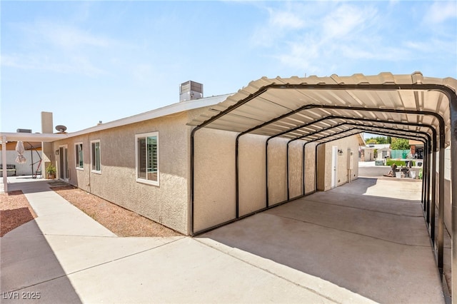 1505 Irene Dr, Boulder City, NV 89005 - view of property exterior with a detached carport and stucco siding