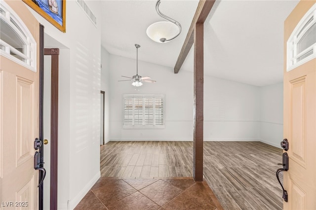 1505 Irene Dr, Boulder City, NV 89005 - entrance foyer with wood finish floors, a ceiling fan, lofted ceiling, and baseboards