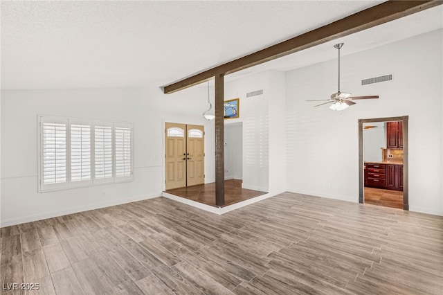 1505 Irene Dr, Boulder City, NV 89005 - unfurnished living room featuring french doors, ceiling fan, light wood-style flooring, and baseboards