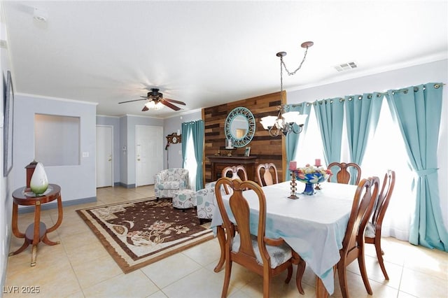 3404 Brayton Mist Dr, North Las Vegas, NV 89081 - dining room with a chandelier, ornamental molding, light tile patterned floors, and a ceiling fan
