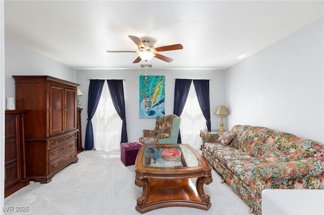 3404 Brayton Mist Dr, North Las Vegas, NV 89081 - living area featuring ceiling fan and light carpet