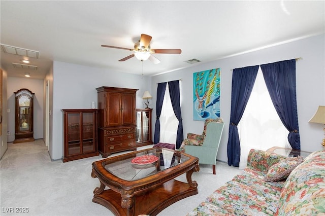 3404 Brayton Mist Dr, North Las Vegas, NV 89081 - living room with light colored carpet, attic access, ceiling fan, and healthy amount of natural light