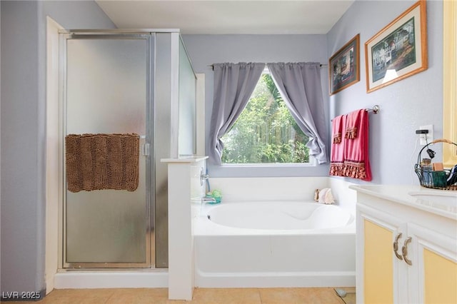 3404 Brayton Mist Dr, North Las Vegas, NV 89081 - bathroom featuring a shower stall, a bath, vanity, and tile patterned floors