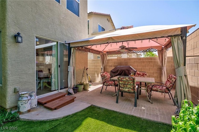 3404 Brayton Mist Dr, North Las Vegas, NV 89081 - view of patio / terrace with a gazebo, entry steps, outdoor dining space, and ceiling fan