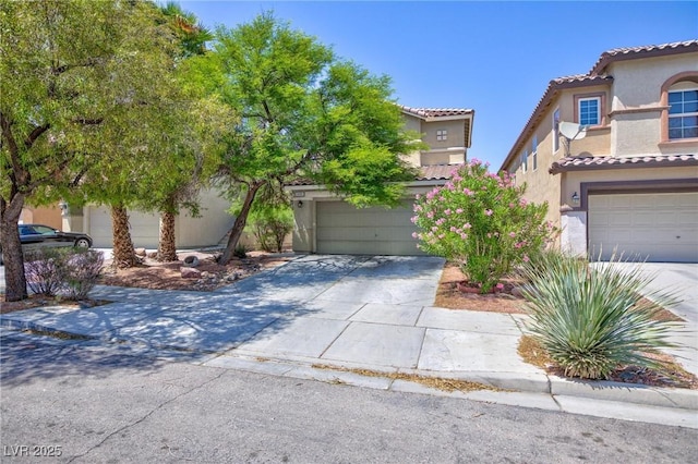 3404 Brayton Mist Dr, North Las Vegas, NV 89081 - view of front of home featuring stucco siding, a tile roof, concrete driveway, and a garage