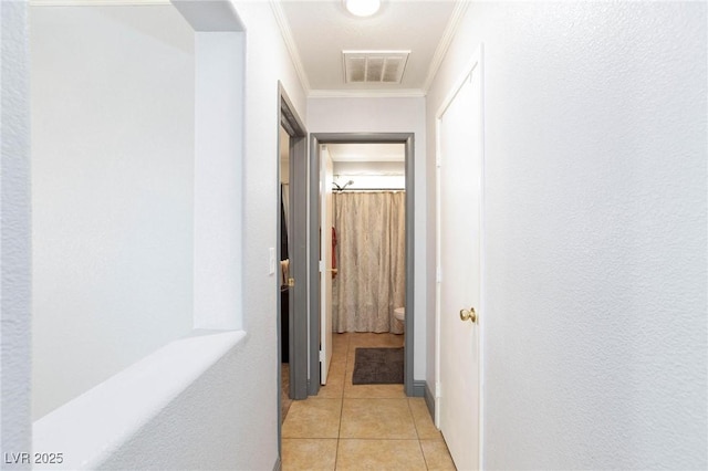 3404 Brayton Mist Dr, North Las Vegas, NV 89081 - hall featuring crown molding and light tile patterned flooring