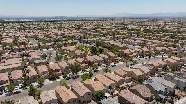 3404 Brayton Mist Dr, North Las Vegas, NV 89081 - aerial perspective of suburban area with mountains