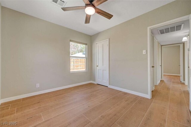 524 Hopi Pl, Boulder City, NV 89005 - unfurnished bedroom with light wood-type flooring, baseboards, and a closet