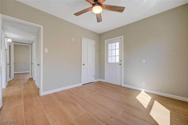 524 Hopi Pl, Boulder City, NV 89005 - empty room with a ceiling fan, light wood-style floors, and baseboards