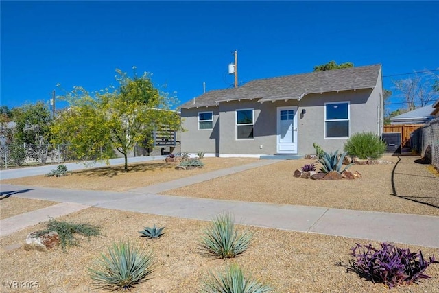 524 Hopi Pl, Boulder City, NV 89005 - view of front of home with stucco siding and roof with shingles