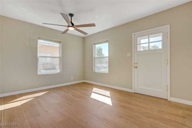 524 Hopi Pl, Boulder City, NV 89005 - entryway with light wood-style floors, ceiling fan, and baseboards