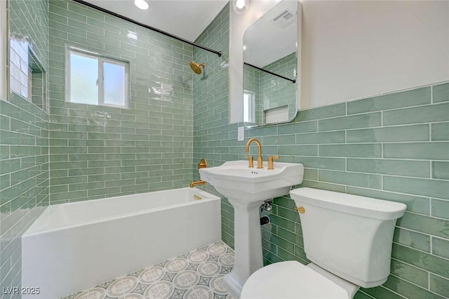 524 Hopi Pl, Boulder City, NV 89005 - full bath with tile walls, toilet, shower / bathtub combination, and tile patterned floors