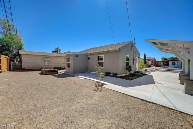 524 Hopi Pl, Boulder City, NV 89005 - back of property with a patio area and stucco siding