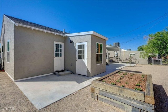 524 Hopi Pl, Boulder City, NV 89005 - rear view of house with a patio area and stucco siding