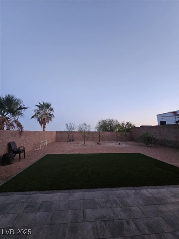 2077 Alki Beach Ave, Laughlin, NV 89029 - fenced backyard featuring a patio area