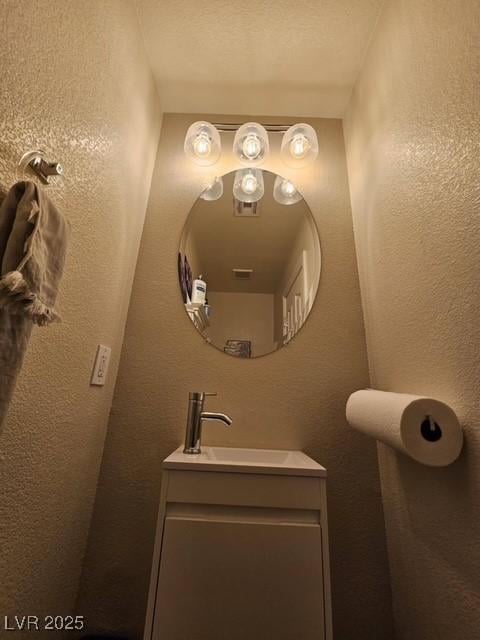 2077 Alki Beach Ave, Laughlin, NV 89029 - bathroom with vanity and a textured wall