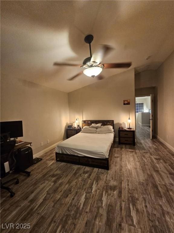 2077 Alki Beach Ave, Laughlin, NV 89029 - bedroom featuring dark wood finished floors, vaulted ceiling, baseboards, a desk, and ceiling fan