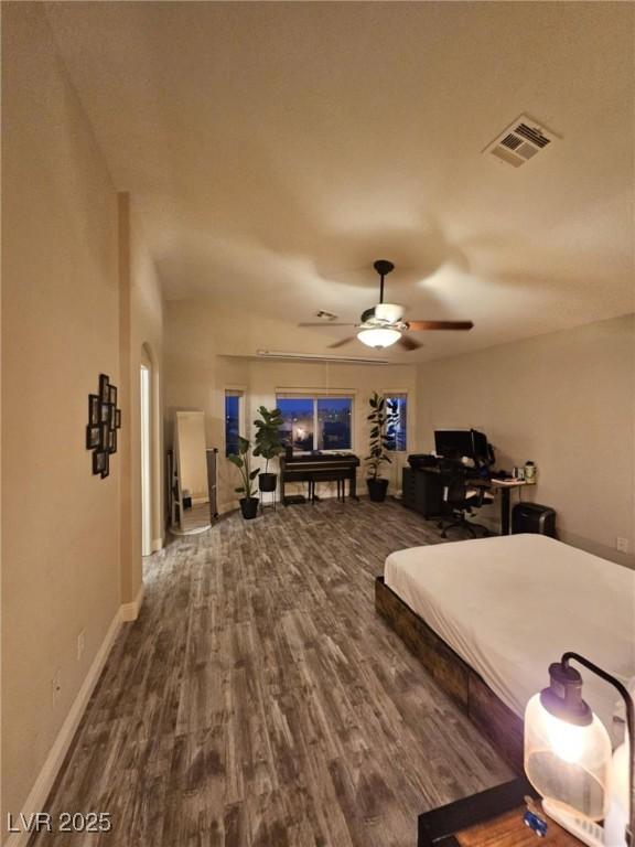 2077 Alki Beach Ave, Laughlin, NV 89029 - bedroom featuring wood finished floors, baseboards, and ceiling fan