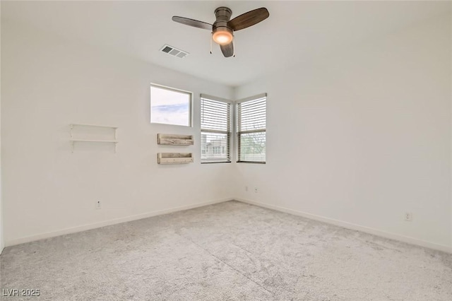6830 Fallen Rock St, North Las Vegas, NV 89084 - unfurnished room with light carpet, baseboards, and a ceiling fan