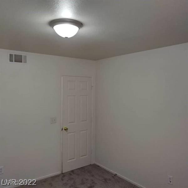 2725 S Nellis Blvd Unit 1158, Las Vegas, NV 89121 - unfurnished room with carpet and baseboards