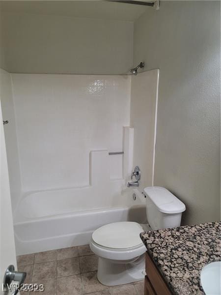 7730 Secret Shore Dr Unit 207, Las Vegas, NV 89128 - bathroom with vanity,  shower combination, toilet, and tile patterned floors
