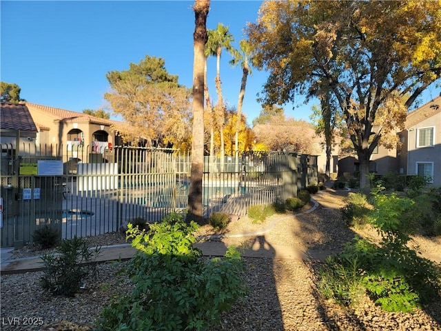 7730 Secret Shore Dr Unit 207, Las Vegas, NV 89128 - view of yard featuring a community pool