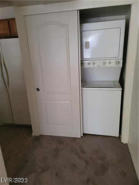 7730 Secret Shore Dr Unit 207, Las Vegas, NV 89128 - laundry area featuring estacked washer and dryer