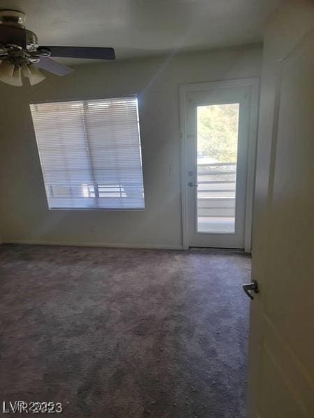 7730 Secret Shore Dr Unit 207, Las Vegas, NV 89128 - carpeted spare room featuring ceiling fan and baseboards