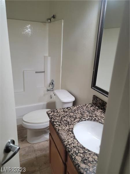 7730 Secret Shore Dr Unit 207, Las Vegas, NV 89128 - full bath with vanity, toilet, shower / bath combination, and tile patterned flooring