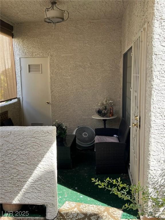 1407 Santa Margarita St Unit A, Las Vegas, NV 89146 - exterior view of stucco siding